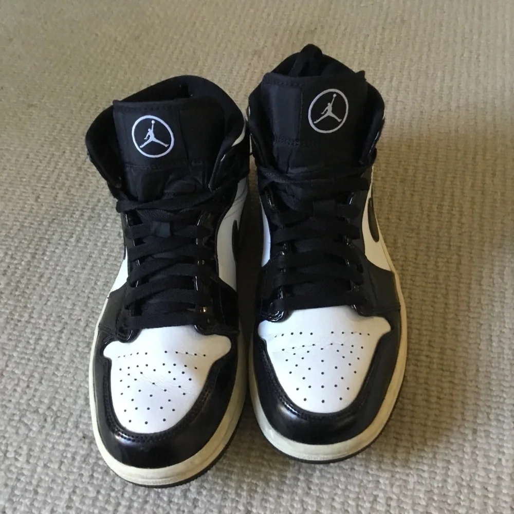 Jordan Black and White High-Top Sneakers